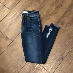 Kancan size 24 jeans, lightly distressed.
